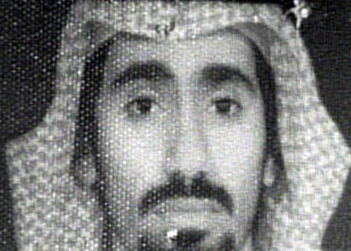 This combination of file photos shows a handout photo (L) obtained on March 1, 2003 of Khalid Sheikh Mohammed, alleged organiser of the September 11, 2001 attacks, shortly after his capture and an ABC World New Tonight handout photo of Abd al-Rashim al-Nashiri, al-Qaeda's chief of operations for the Gulf and a suspected mastermind of the USS Cole bombing in Yemen obtained November 23 2002. The US Senate released on December 9, 2014, the most thorough public report on interrogation techniques used by the CIA after September 11 on suspected members of Al-Qaeda that many say amounts to torture. In February 2008, Director of the CIA Michael Hayden acknowledged three detainees were subject to waterboarding: 9/11 mastermind Khalid Sheikh Mohammed (KSM), influential Al-Qaeda member Abu Zubaydah(Not shown) and accused USS Cole bombing mastermind Abd Rahim Al-Nashiri. KSM was apparently subject to the waterboarding practice 183 times.FILES/AFP/Getty Images ** OUTS - ELSENT, FPG - OUTS * NM, PH, VA if sourced by CT, LA or MoD **