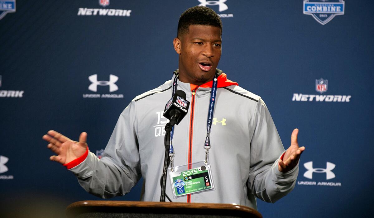 Florida State quarterback Jameis Winston addresses the media during a news conference at the NFL Combine on Friday at Lucas Oil Stadium in Indianapolis.