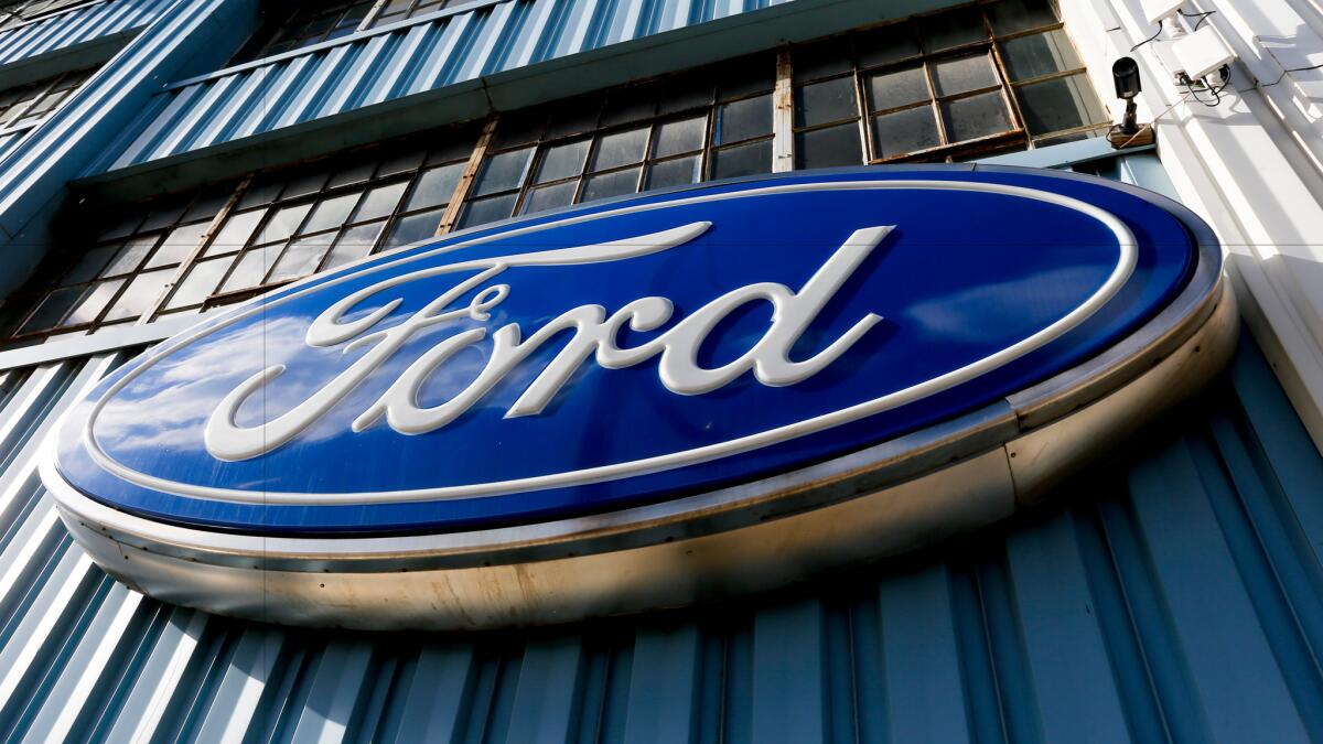 A sign above the entrance to Butler County Ford in Butler, Pa. Ford is recalling about 830,000 vehicles in the U.S. and Mexico due to faulty door latches.