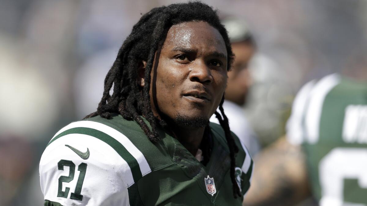 New York Jets running back Chris Johnson looks on during a game against the Detroit Lions on Sept. 28. The Jets parted ways with Johnson in February.