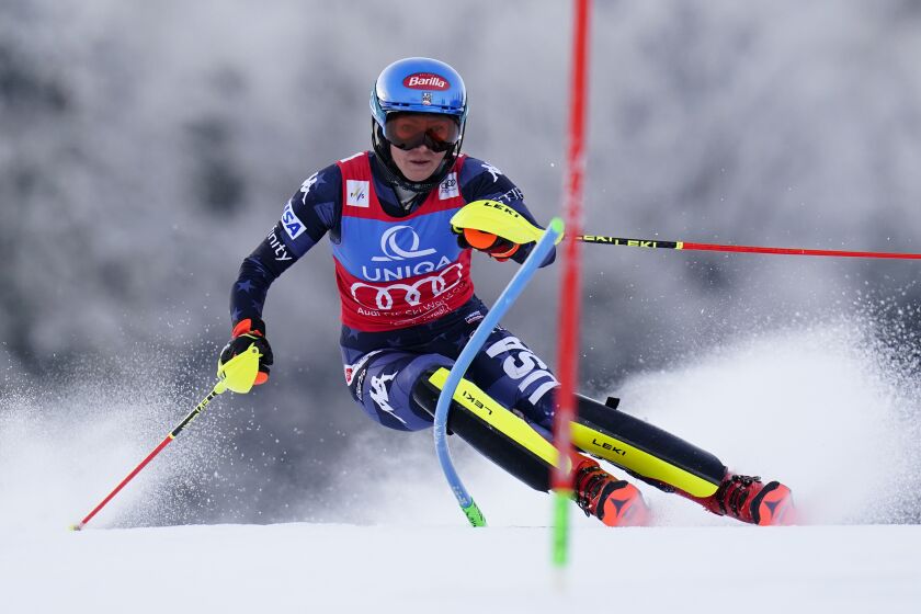 United States' Mikaela Shiffrin speeds down the course during an alpine ski, women's World Cup slalom, in Spindleruv Mlyn, Czech Republic, Sunday, Jan. 29, 2023. (AP Photo/Piermarco Tacca)