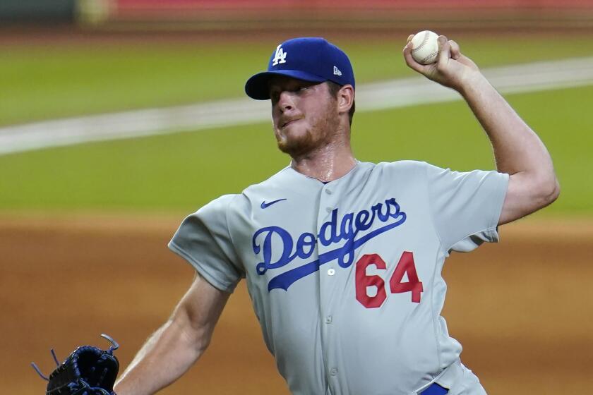 Dodgers pitcher Caleb Ferguson throws against the Astros on July 28, 2020, in Houston.