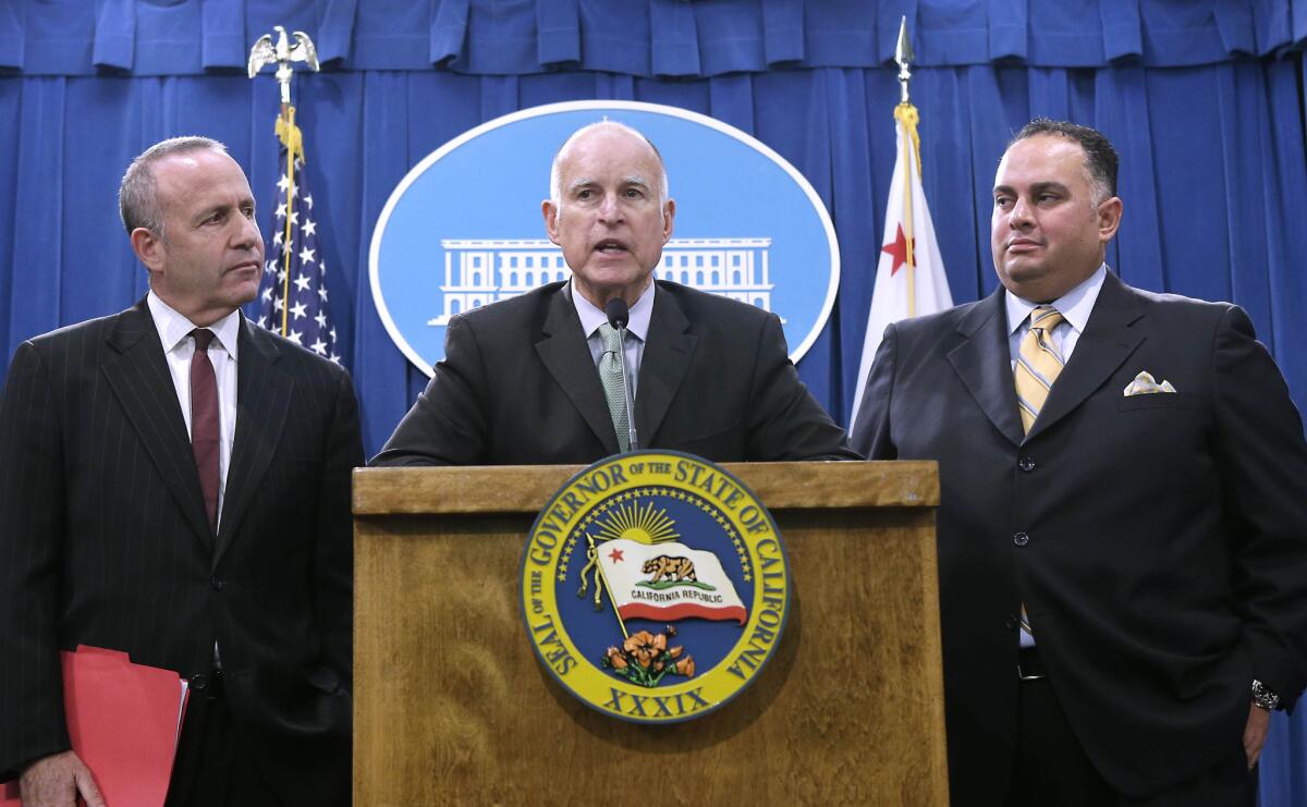 Gov. Jerry Brown, joined by Senate President Pro Tem Darrell Steinberg (D-Sacramento), left, and Assembly Speaker John Perez (D-Los Angeles), discusses the budget compromise reached last week. All three could be in for pay raises, depending on what a citizens panel decides Wednesday.
