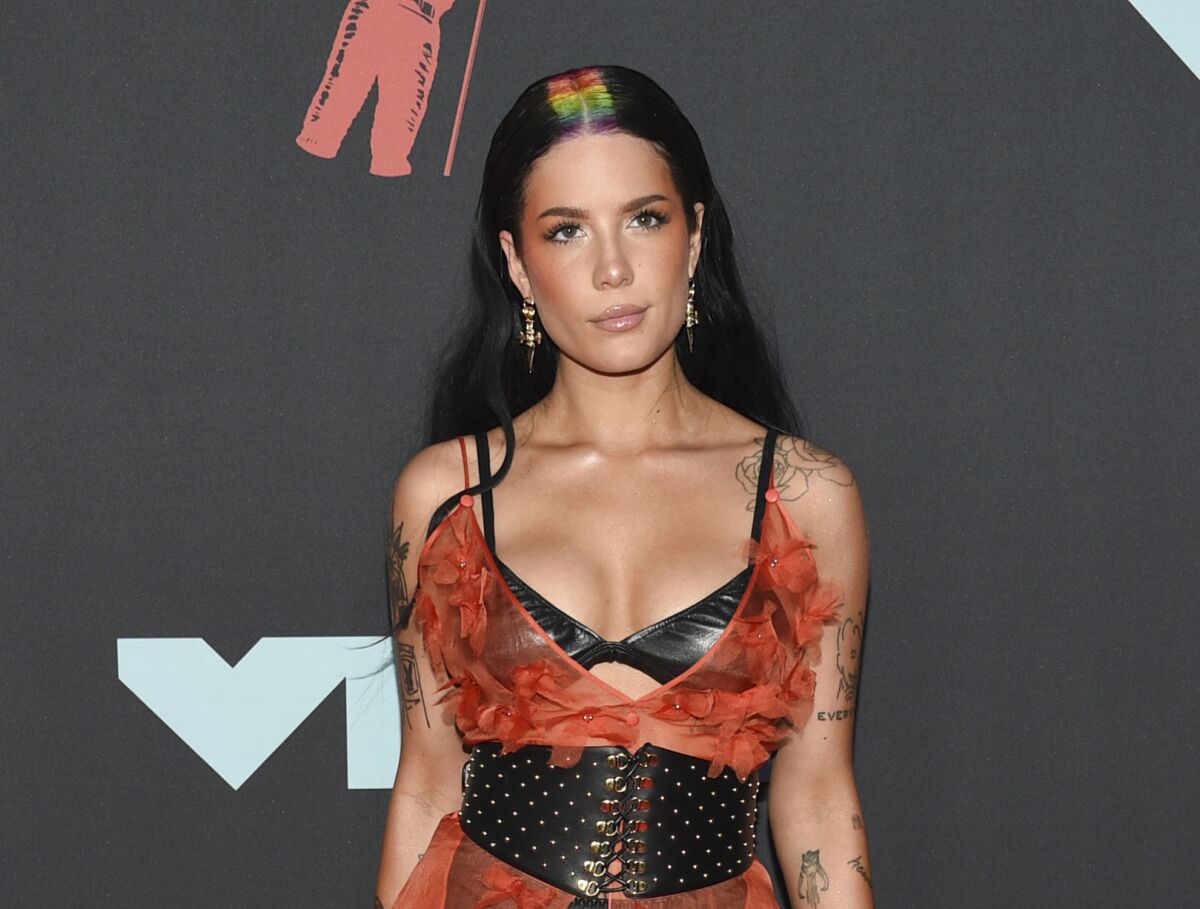 FILE - Halsey arrives at the MTV Video Music Awards in Newark, N.J. on Aug. 26, 2019. Halsey's latest album, “If I Can’t Have Love, I Want Power,” releases this week. (Photo by Evan Agostini/Invision/AP, File)