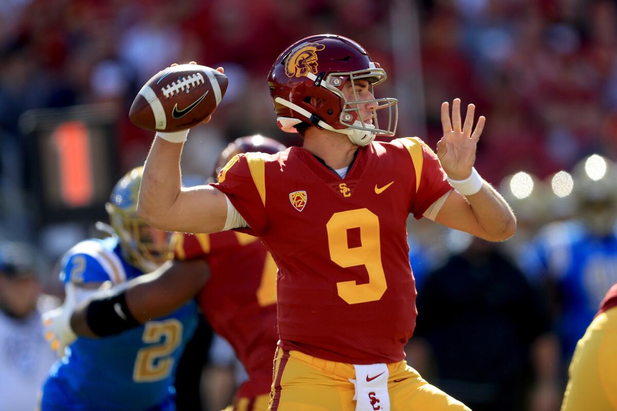 USC quarterback Kedon Slovis passes during the first half against UCLA at the Coliseum on Nov. 23, 2019.