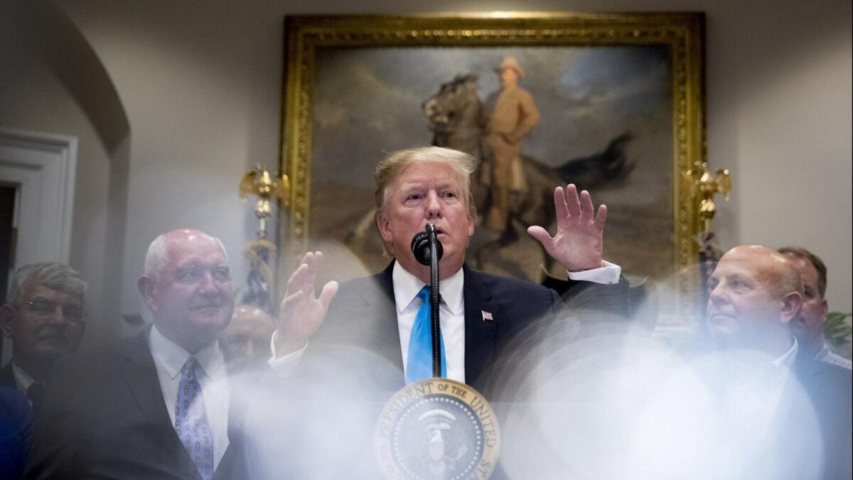 President Trump gestures as he speaks about the infrastructure negotiations with House Speaker Nancy Pelosi and other Democratic leaders in Washington on May 23.