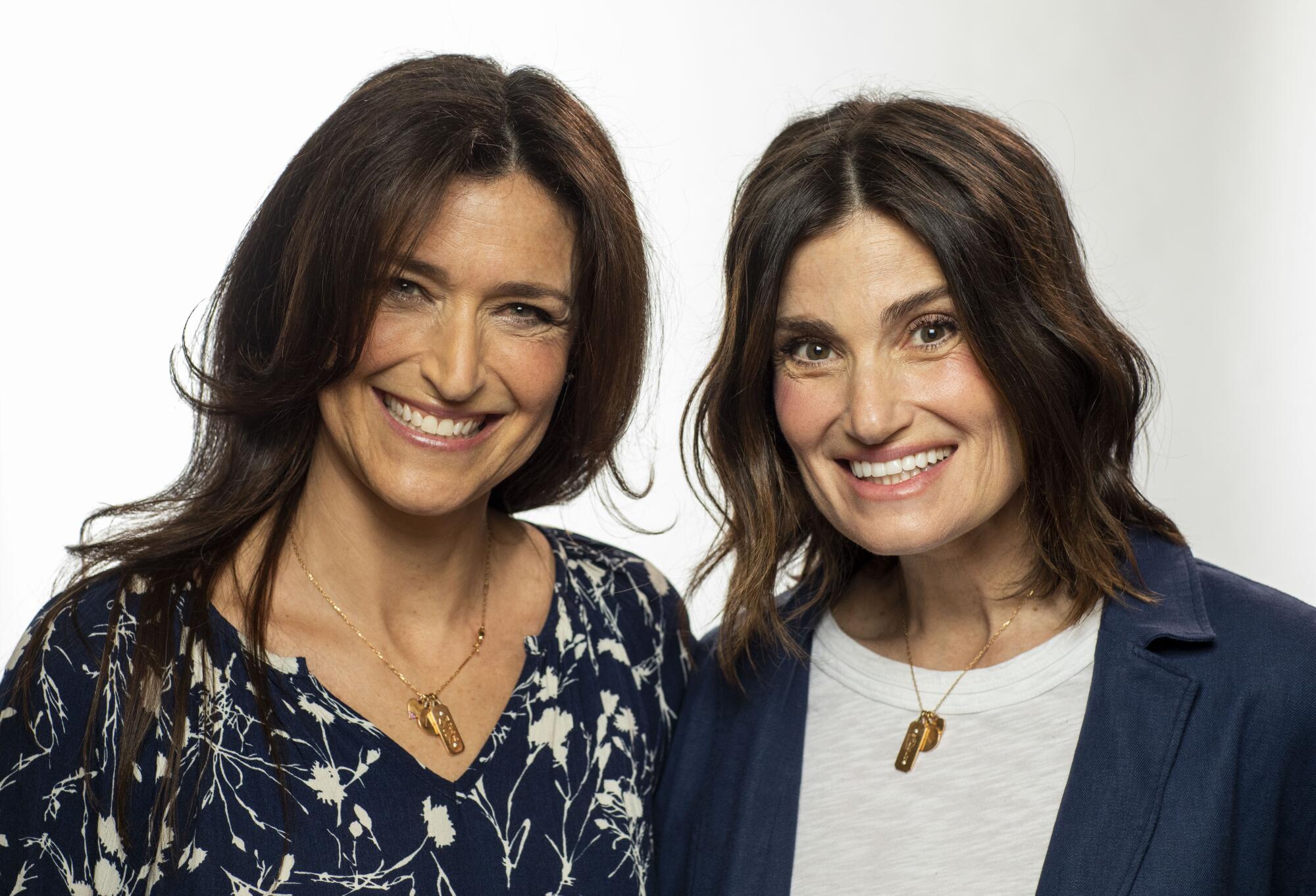 Cara Mentzel and Idina Menzel at the Los Angeles Times Festival of Books portrait studio.