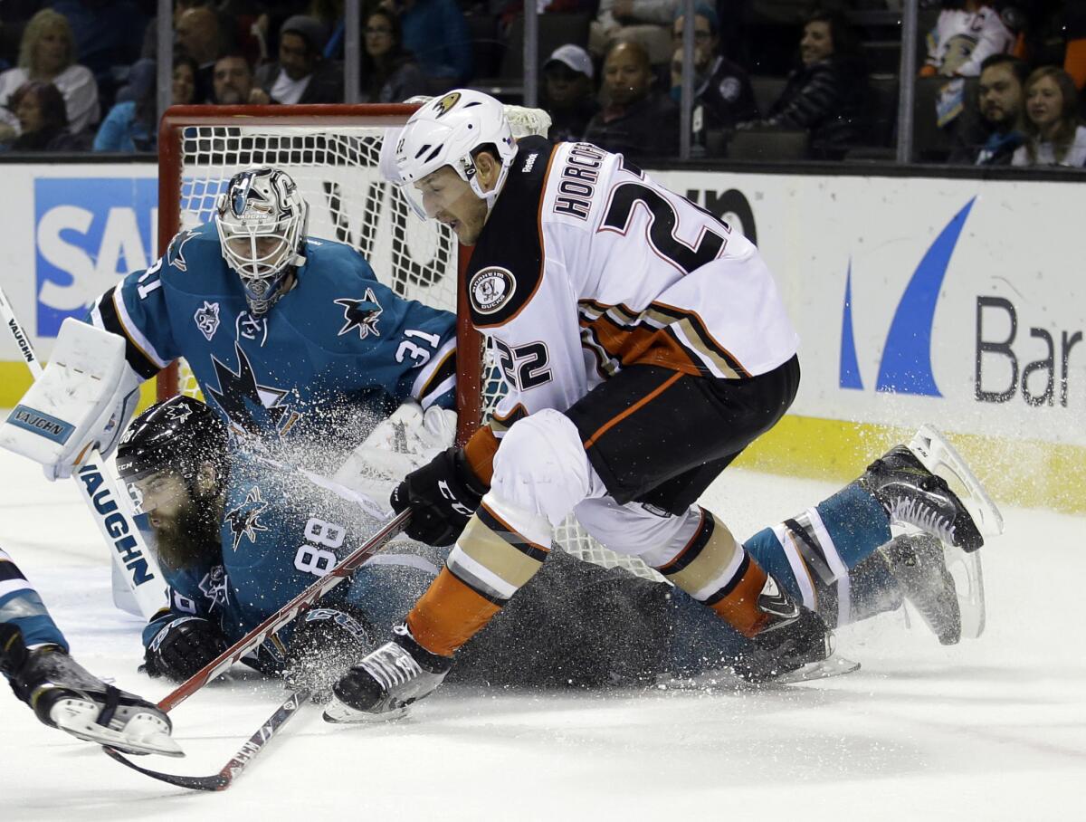 San Jose Sharks defenseman Brent Burns (88) gets in front of a shot from Anaheim Ducks forward Shawn Horcoff (22) during the second period of a game on Nov. 7.