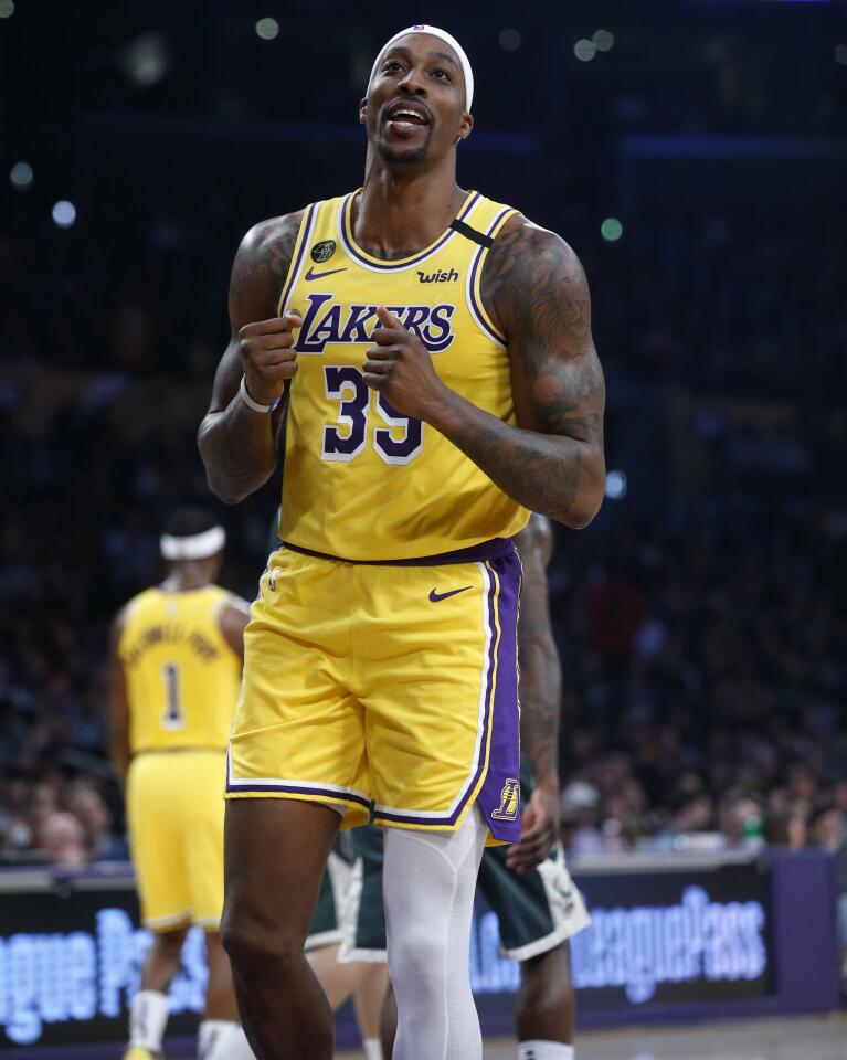 Lakers center Dwight Howard reacts to a foul call during a game against the Bucks on March 6 at Staples Center.