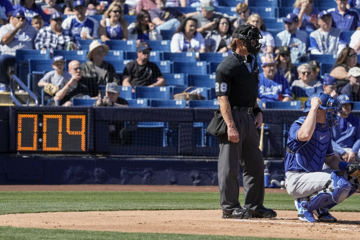 A pitch clock is seen during a spring training game between the Dodgers and the Milwaukee Brewers in Phoenix on Feb. 25.