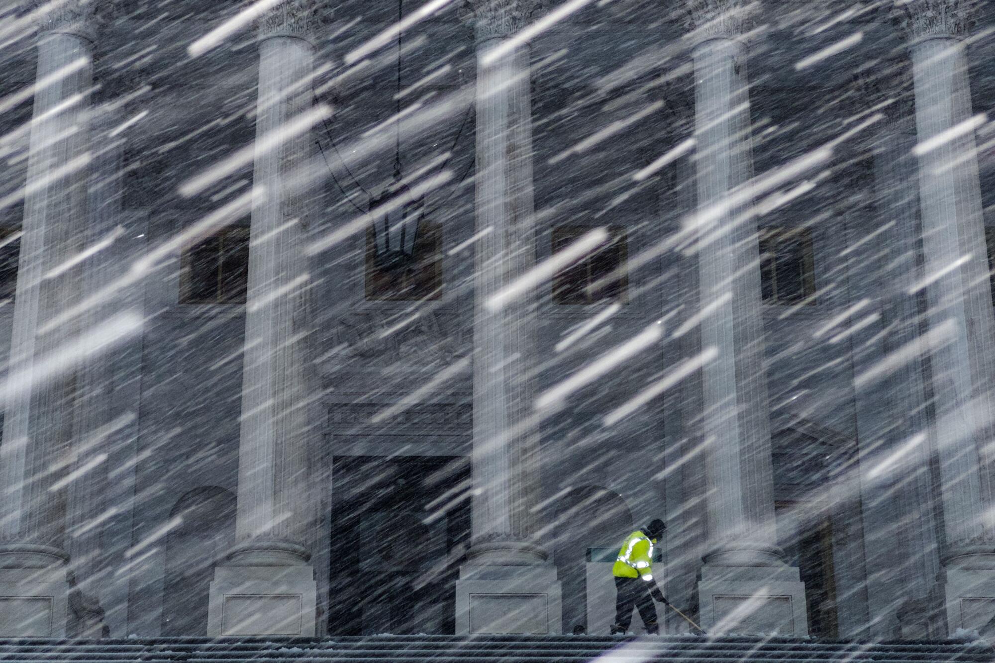 Snow falling, seen from the steps of the Capitol