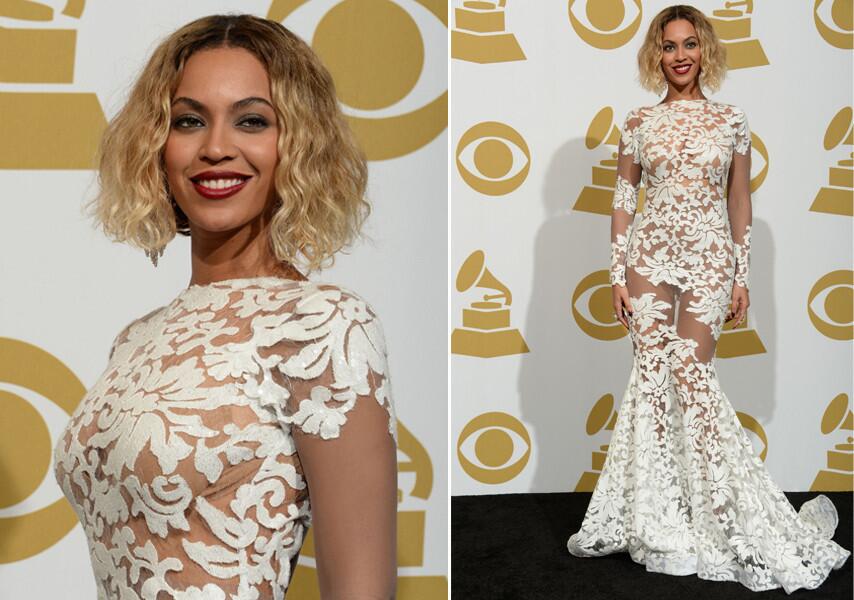She may not have walked the red carpet, but she stole the fashion show. After performing the opening number, the pop diva changed into a sheer white floral lace gown that was exactly the kind of risque style statement we expect to see on music's biggest night. The dress was created by 31-year-old L.A.-based designer and "Project Runway" alum Michael Costello. To read an interview with Costello about this dress, click here.