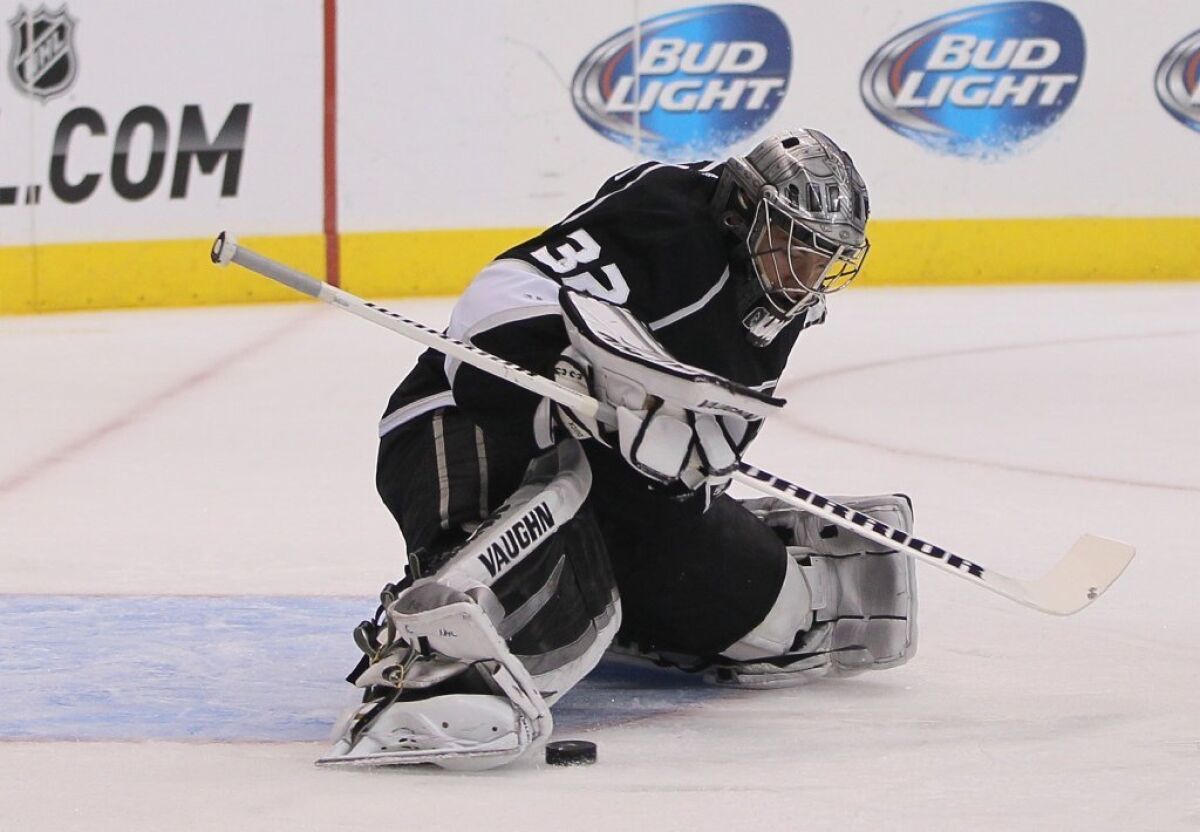 Jonathan Quick makes a toe save against the Vancouver Canucks on Nov. 9.