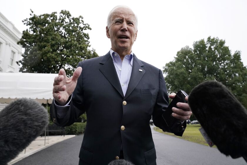 President Joe Biden speaks to the media before boarding Marine One on the South Lawn of the White House, Monday, Oct. 3, 2022, for a short trip to Andrews Air Force Base, Md., and then on to Puerto Rico. (AP Photo/Andrew Harnik)
