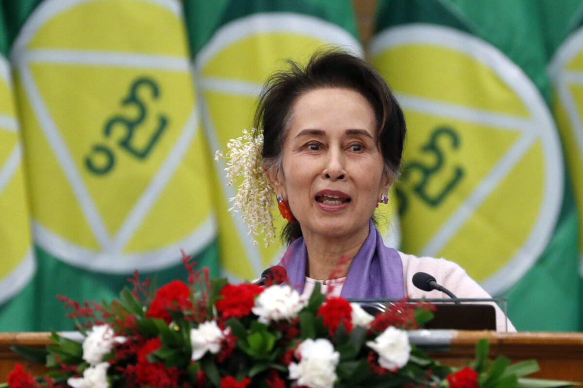 FILE - Myanmar's leader Aung San Suu Kyi delivers a speech during a meeting on implementation of Myanmar Education Development at the Myanmar International Convention Center in Naypyidaw, Myanmar, on Jan. 28, 2020. A court in Myanmar ruled Friday, June 3, 2022, that state prosecutors have submitted enough evidence for the trial of deposed leader Aung San Suu Kyi on an election fraud charge to continue, a legal official familiar with the case said. (AP Photo/Aung Shine Oo)