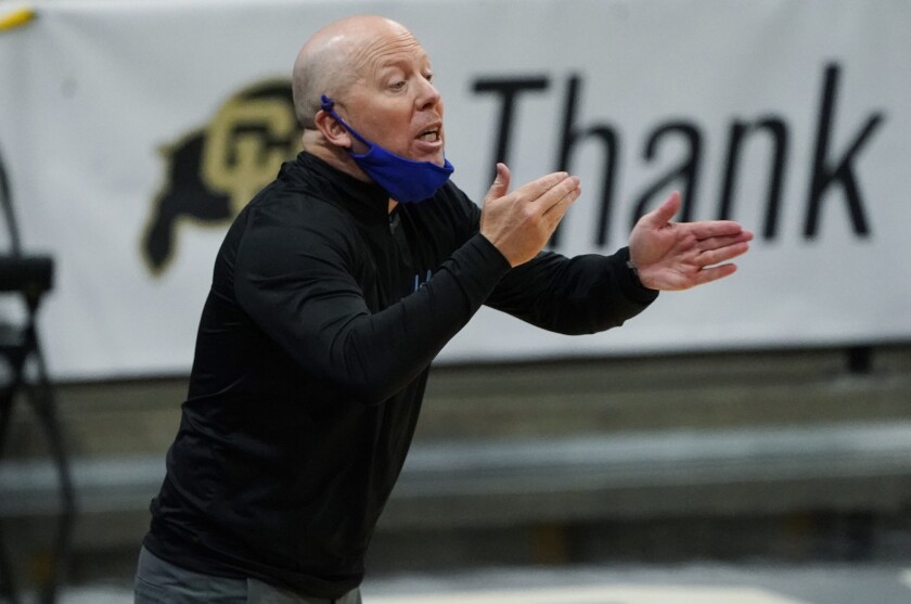 UCLA coach Mick Cronin directs his players during a game against Colorado.