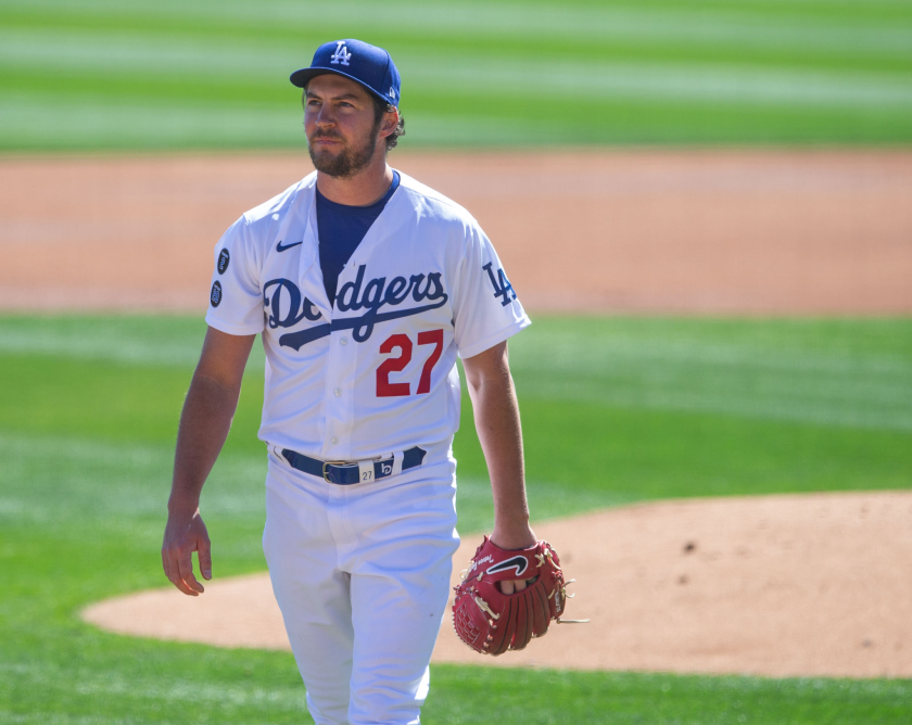 Trevor Bauer walks off the pitching mound.