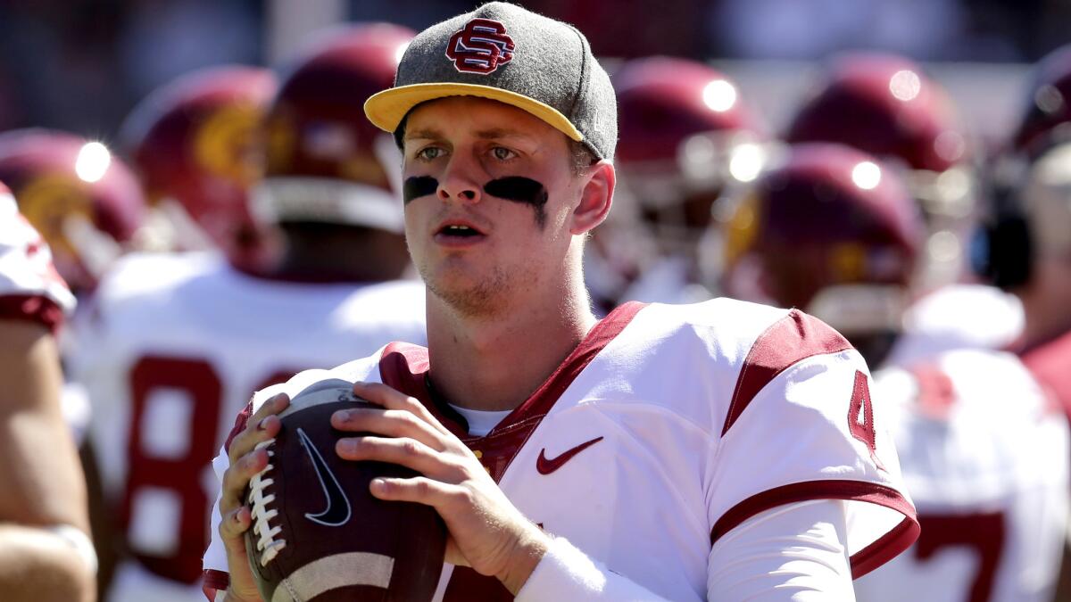 Max Browne warms up for a USC practice