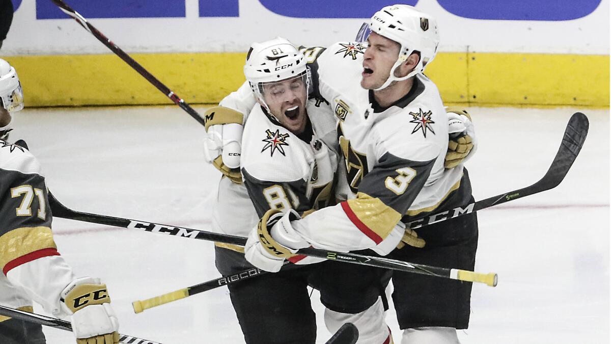 Golden Knights defenseman Brayden McNabb, right, celebrates with Jonathan Marchessault after scoring a second period goal.