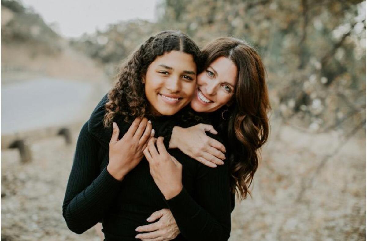 UCLA softball player Maya Brady poses with her mother Maureen, a former All-American softball pitcher at Fresno State.