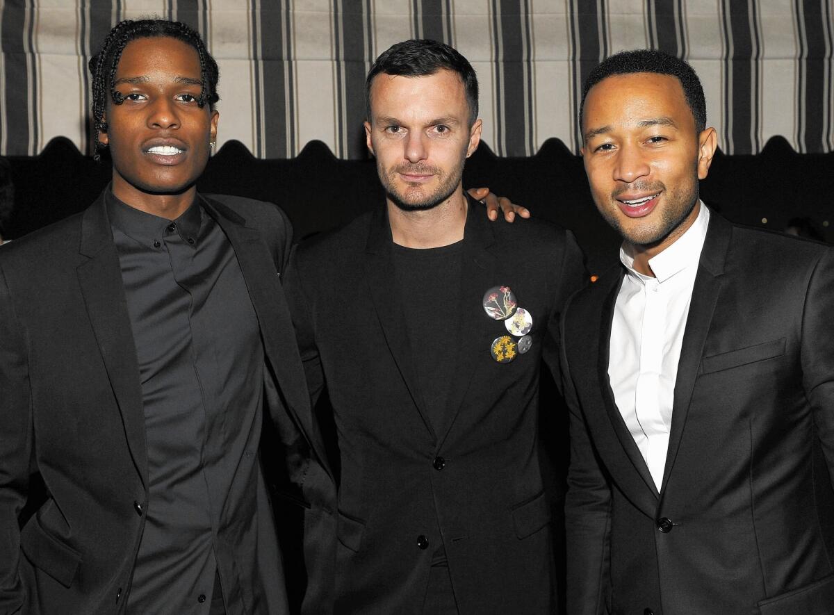 From left, ASAP Rocky, Dior Homme creative director Kris van Assche and singer-songwriter John Legend.