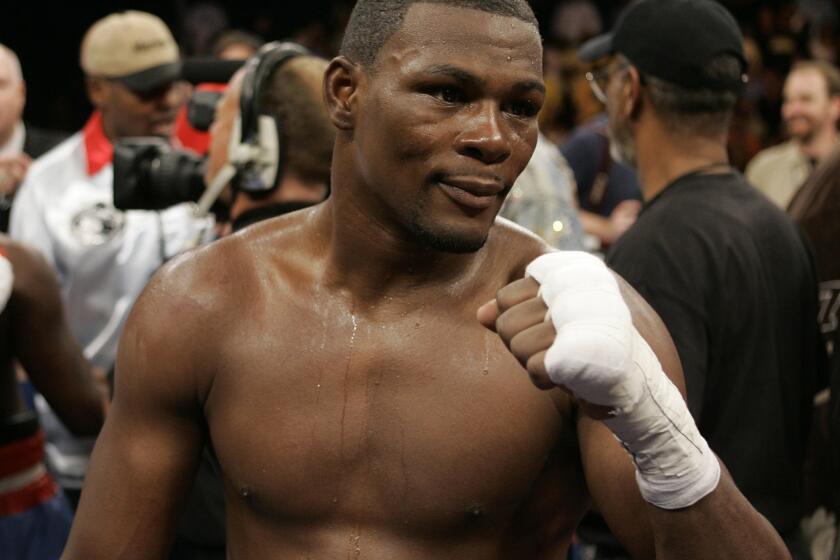 Jermain Taylor poses after winning by split decision over Cory Spinks in 2007.
