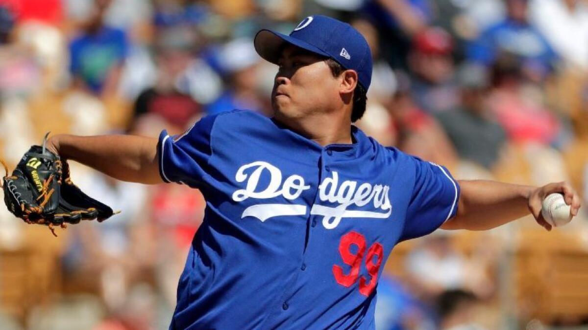 Dodgers starting pitcher Hyun-Jin Ryu throws against the Angels during a spring-training game on March 11 in Phoenix.