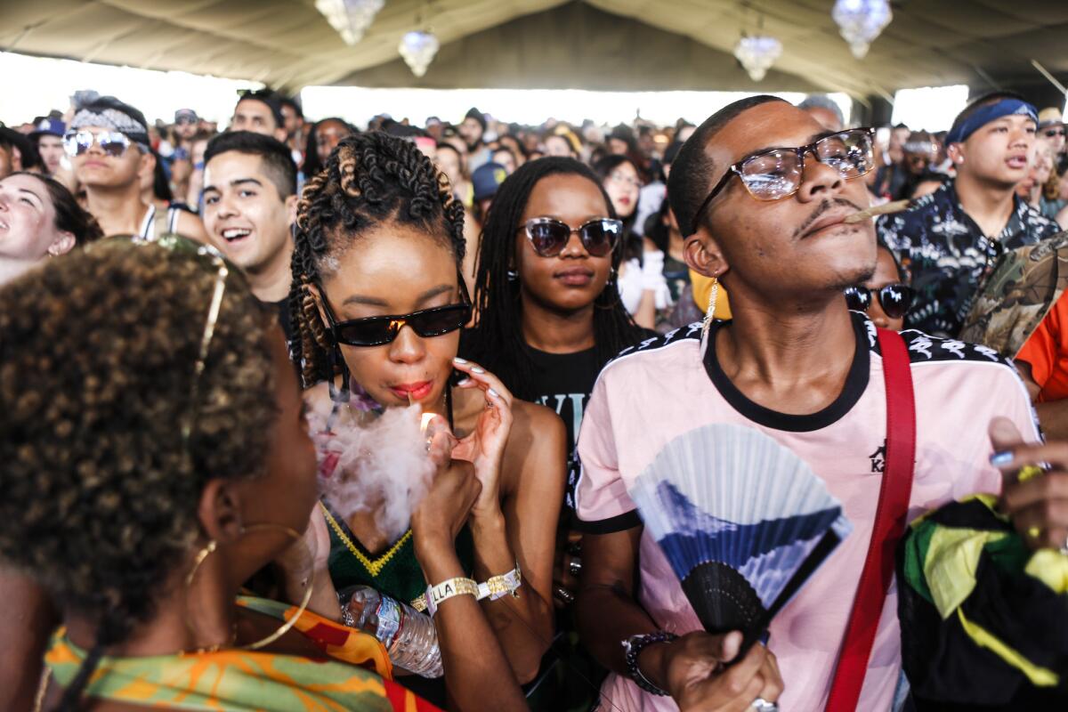 Fans enjoy the sounds of Kelela's performance.