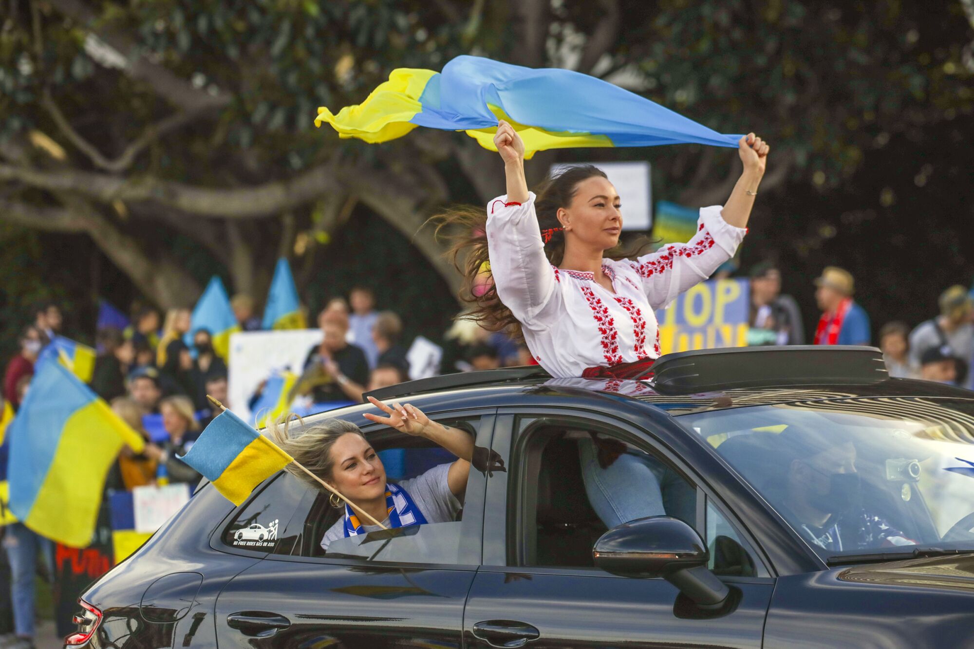 Demonstrators protest the Russian invasion of Ukraine at the intersection of Sepulveda Blvd. and Santa Monica Avenue