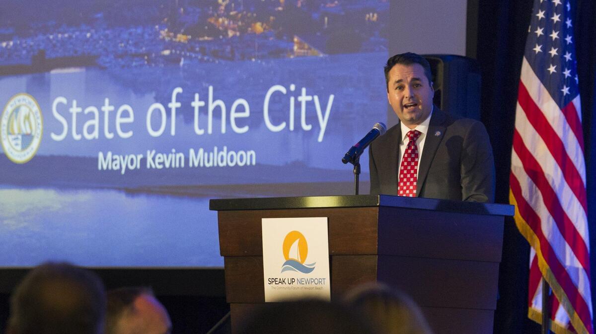 Newport Beach Mayor Kevin Muldoon gives the state of the city address during the 36th annual Mayor’s Dinner at the Newport Beach Marriott Hotel and Spa on Friday.