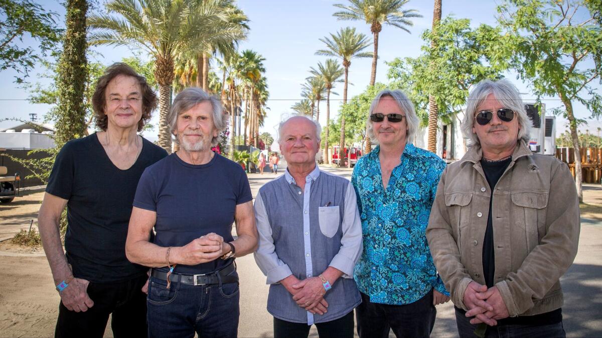 Zombies band members, from left, Colin Blunstone, Rod Argent, Jim Rodford, Tom Toomey and Steve Rodford gather before the group's performance April 28 at the Stagecoach country music festival in Indio.