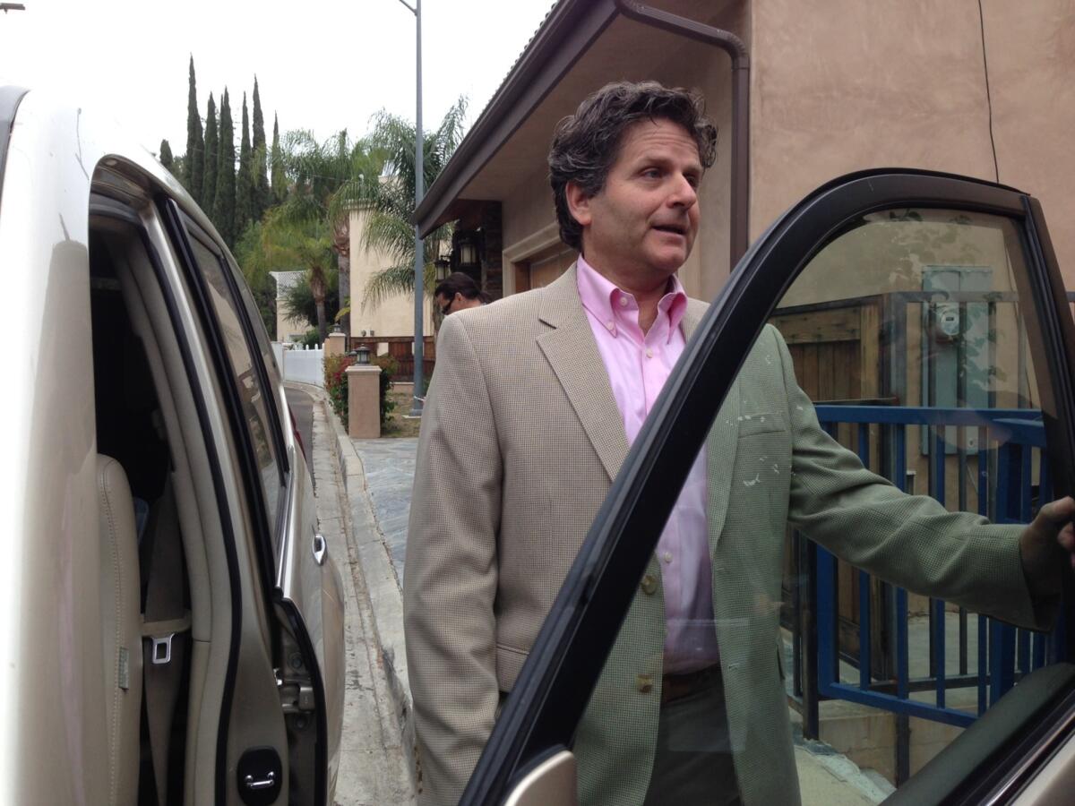 Alan Shifman, an attorney representing Elliot Rodger's family, speaks to reporters outside the family's Woodland Hills home on May 24.