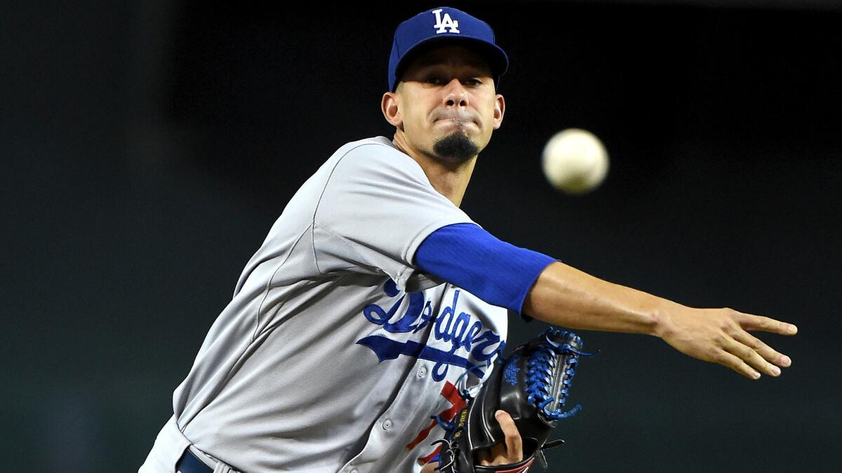 Dodgers right-hander Carlos Frias delivers a pitch against the Diamondbacks in his last start on June 30 in Phoenix.