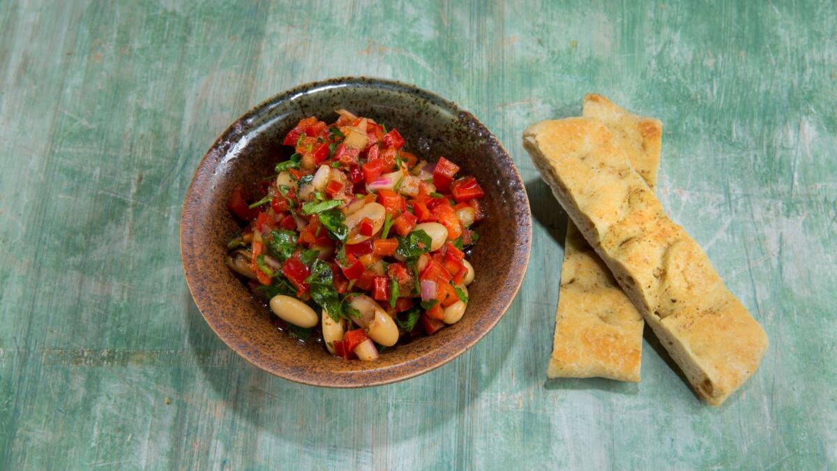 Piyas, meaning “onions,” blends bell peppers, red onions and parsley, with a squeeze of fresh lemon and sweetened with pomegranate molasses.