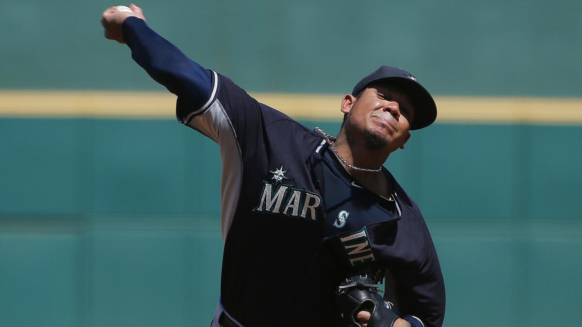 Seattle Mariners starter Felix Hernandez delivers a pitch during an exhibition game against the Cleveland Indians on March 31.