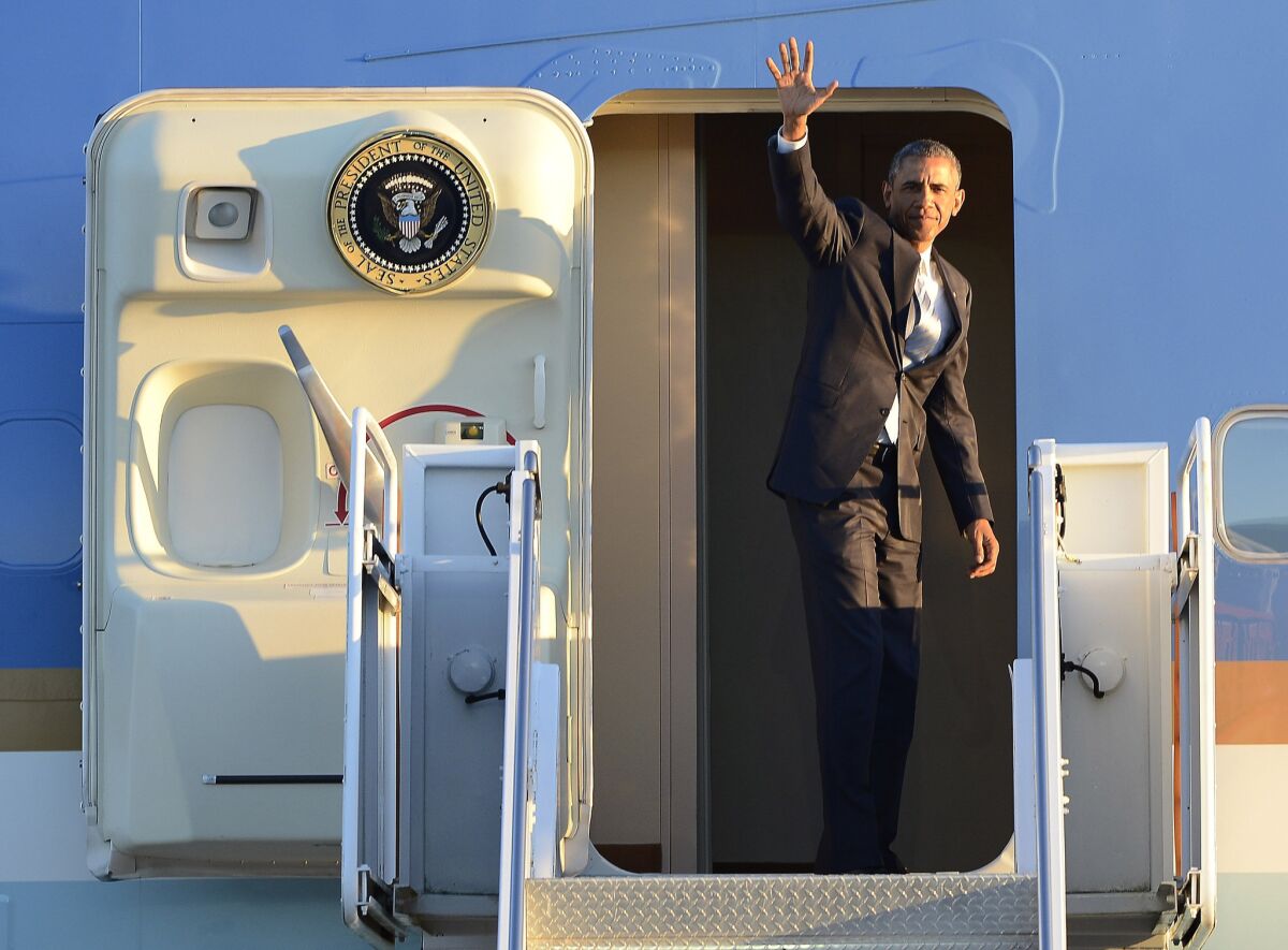 President Obama boards Air Force One after a visit to Alcoa, Tenn., on Friday.