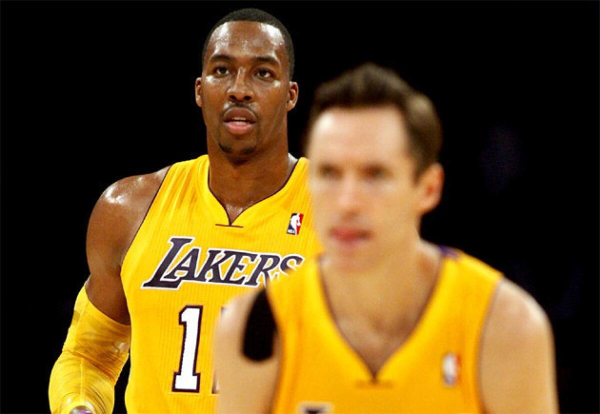 Lakers' Steve Nash, right, hopes to have Dwight Howard back on the team next season.