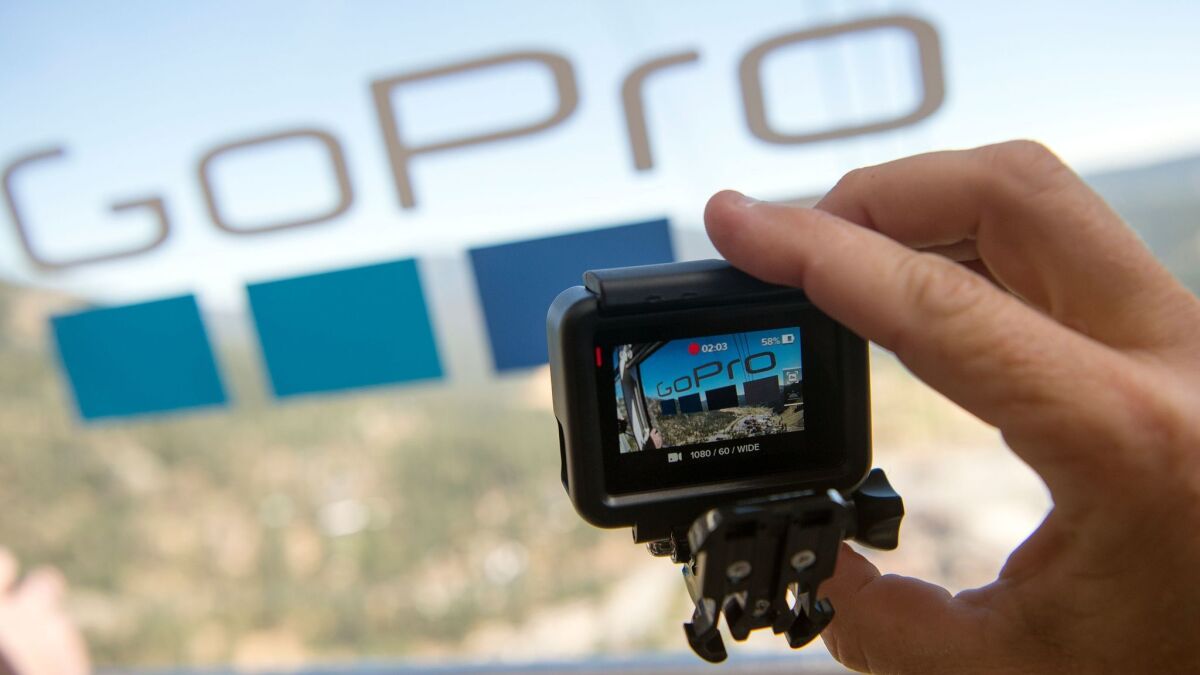 A person takes a video with a GoPro Hero 5 Black in Olympic Valley, Calif., last year.