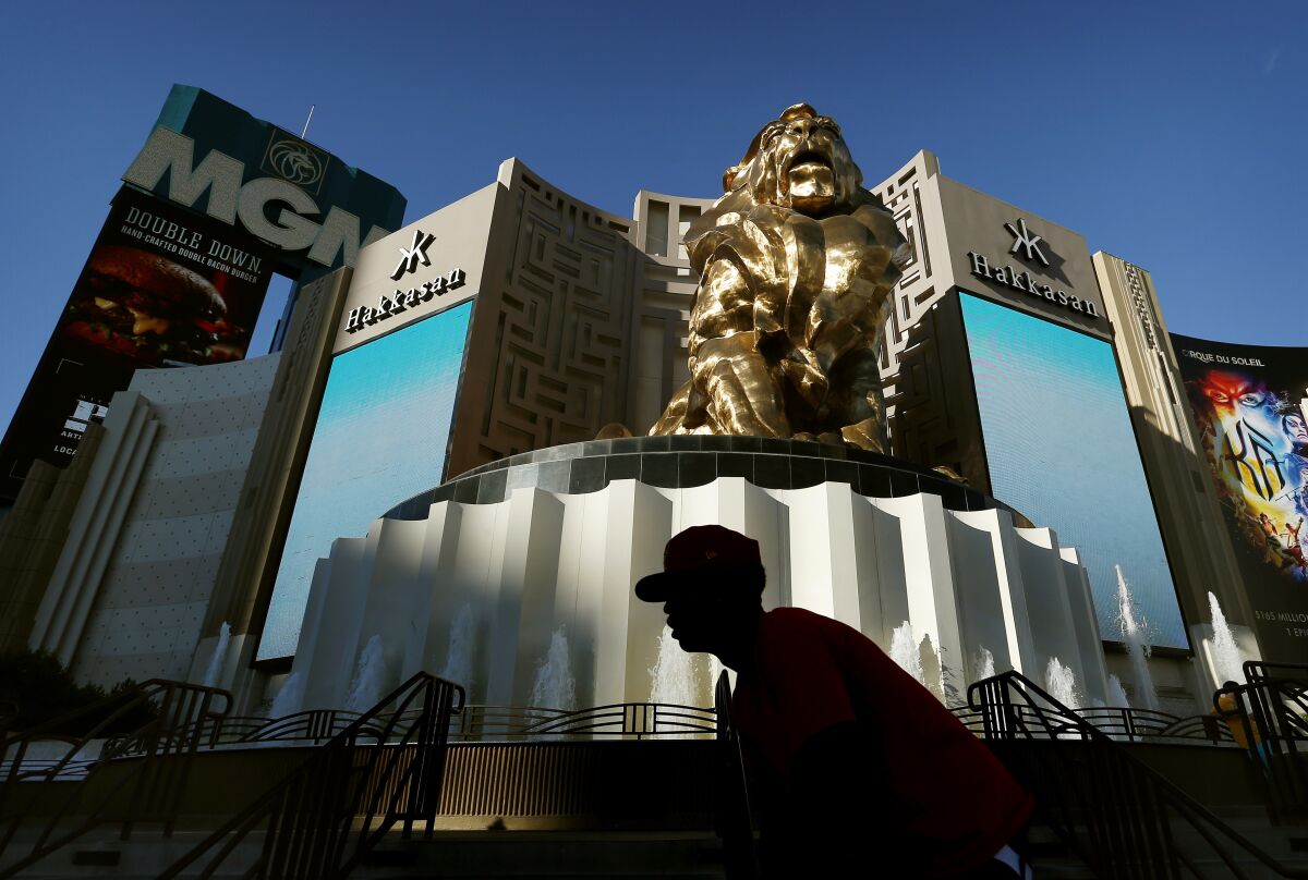 A man bikes past the MGM Grand in Las Vegas