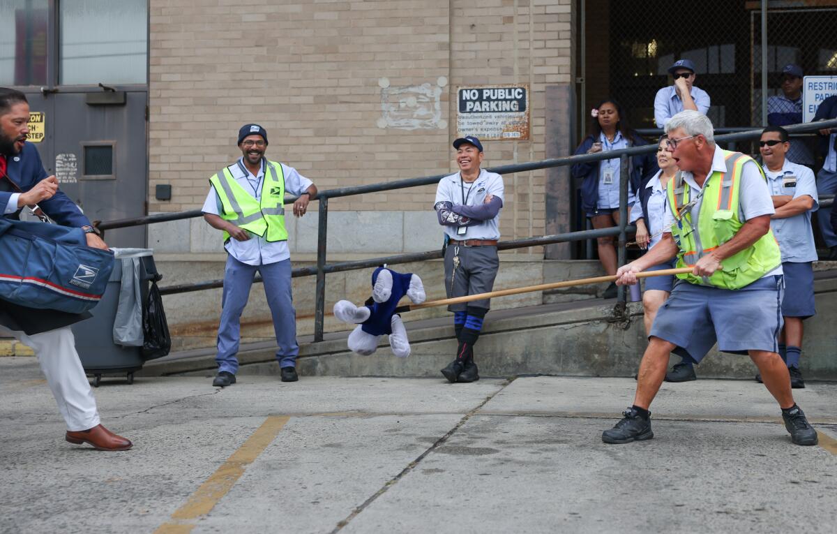 A demonstration for United States Postal Service's Dog Bite Awareness campaign on Tuesday.