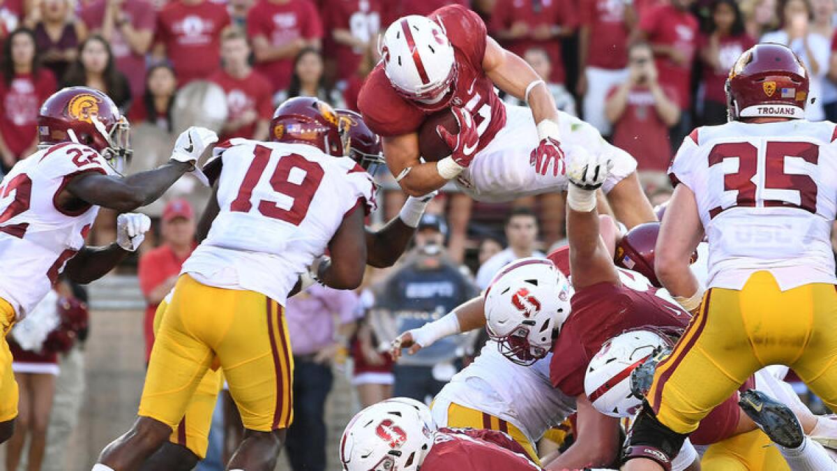 The Trojans stop Christian McCaffrey short of the goal line on this play. Click the photo to see more images.