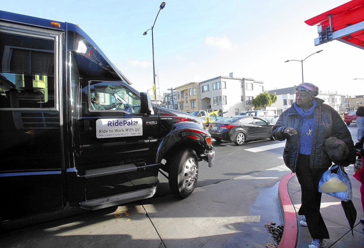 A RidePal bus ferries commuters from San Francisco to tech campuses an hour or more away.