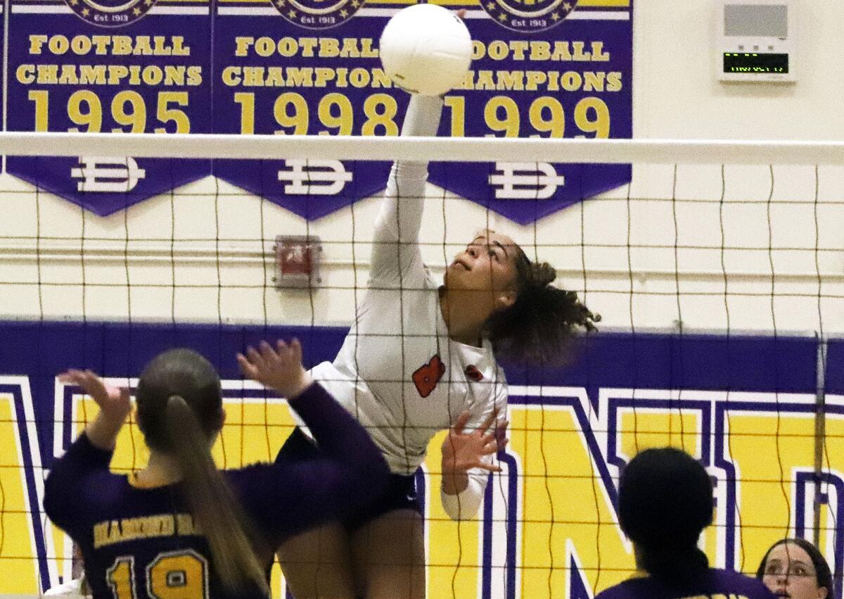 Pacifica Christian's Chara Wondercheck (8) spikes the ball against Diamond Bar on Thursday.