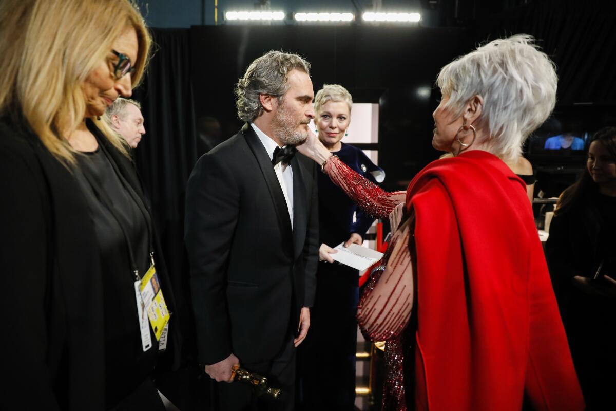 Joaquin Phoenix, winner of the lead actor Oscar for “Joker” with Olivia Colman and Jane Fonda backstage at the 92nd Academy Awards.