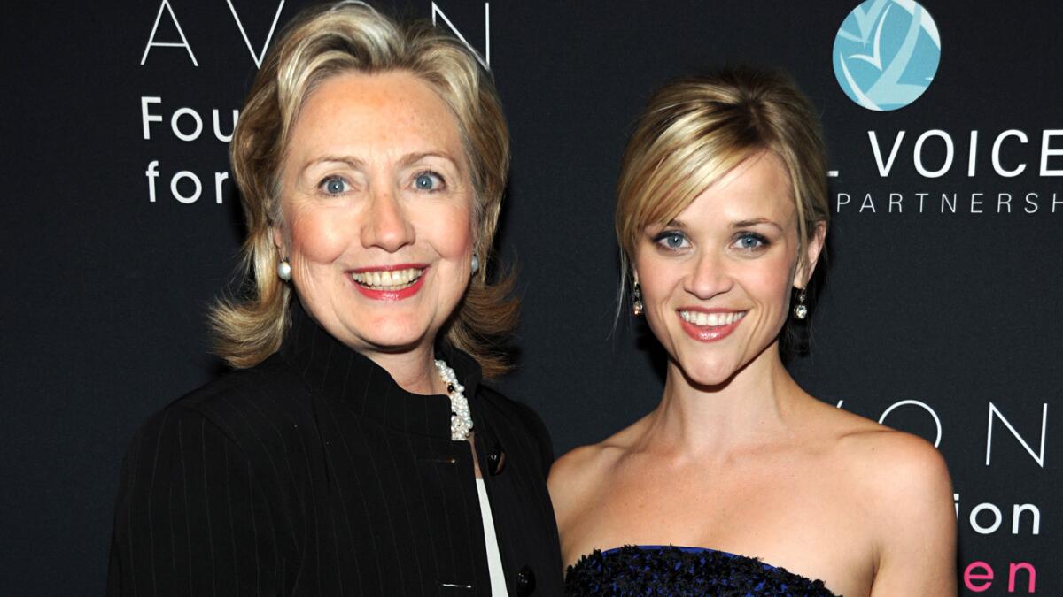 Hillary Rodham Clinton, who was then secretary of State, and actress Reese Witherspoon attend the Vital Voices 2010 Global Leadership Awards.