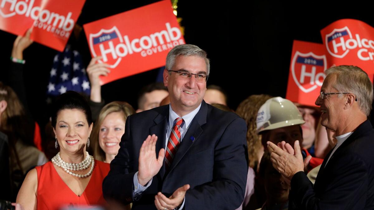 Republican gubernatorial candidate Lt. Gov. Eric Holcomb thanks supporters after winning his race at an election night rally in Indianapolis, Nov. 8, 2016.