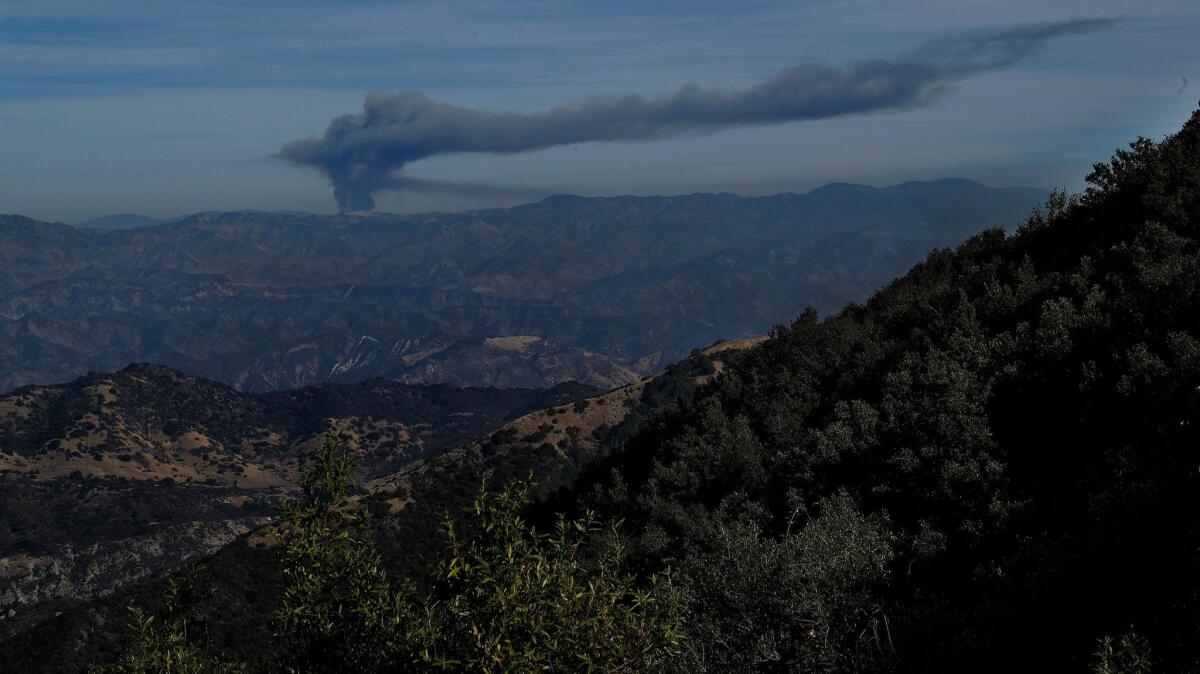 A plume of smoke is visible from Gibraltar Ridge, located above Santa Barbara and Montecito, on Dec. 18, 2017. (Mel Melcon/Los Angeles Times)