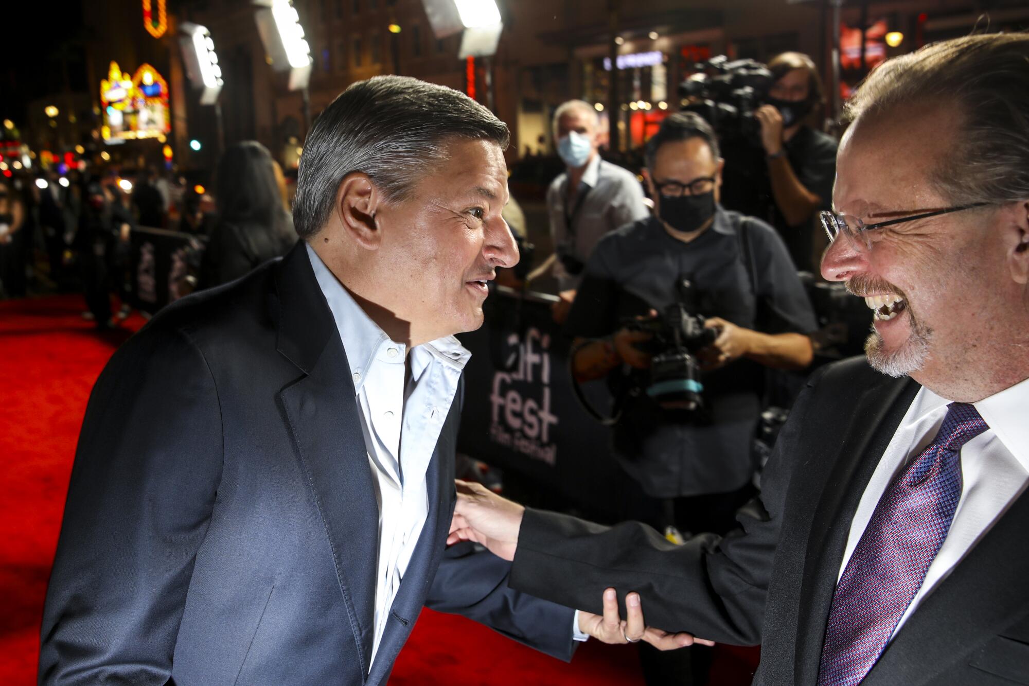  Ted Sarandos and Bob Gazalle on the red carpet.
