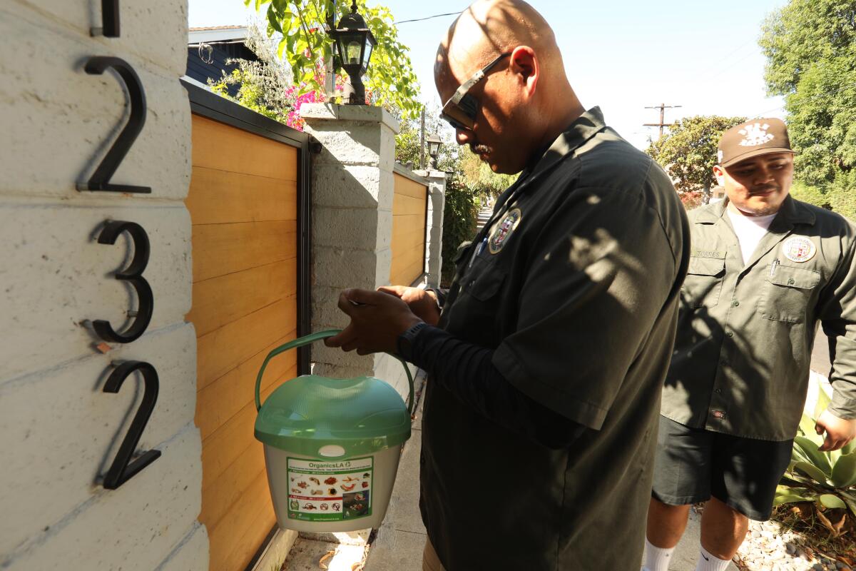 Workers outside a home