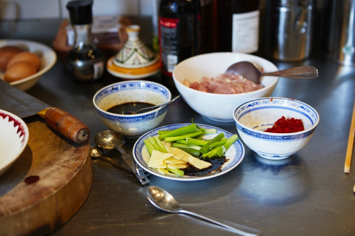 Ingredients laid out in preparation to make kung pao chicken